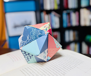 Where Divine Proportion Becomes a Star (Stellar Octahedron on Luca Pacioli's De Divina Proportione) Polyhedra Origami